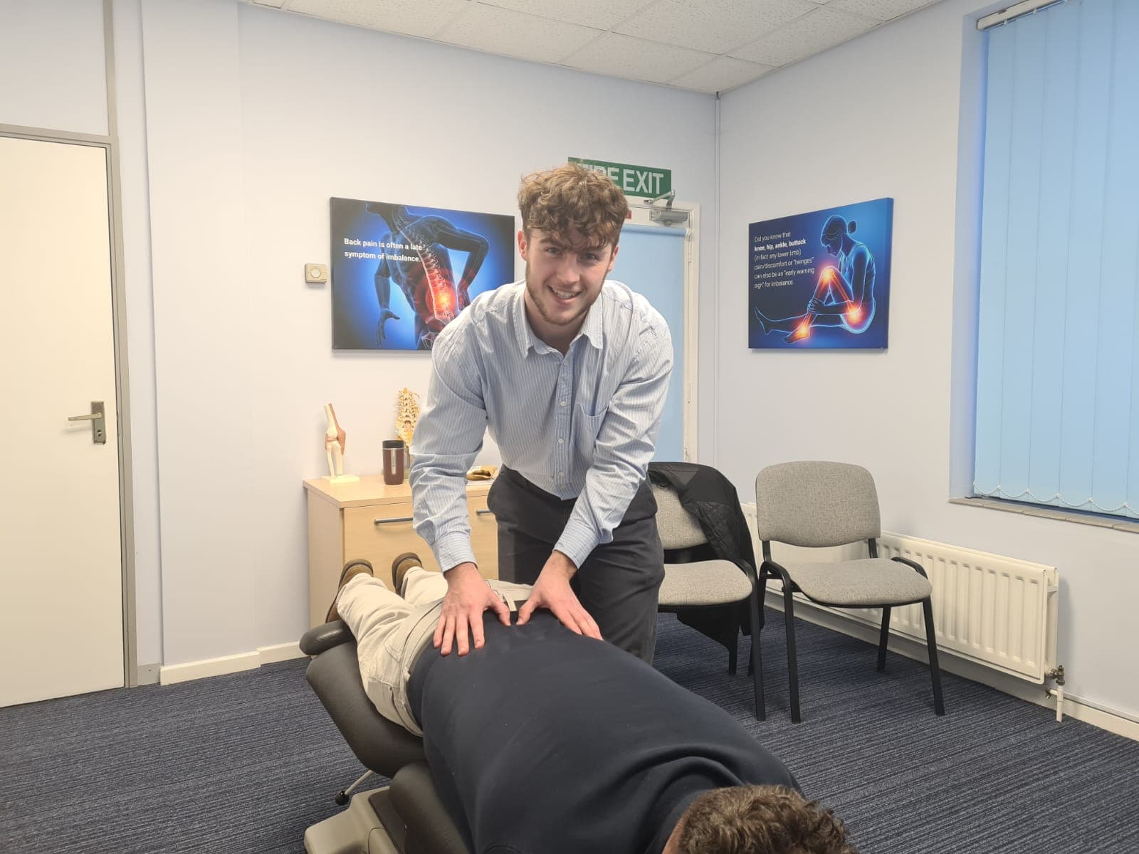 Joe Sanyal treating a patient at Frameworks Clinic